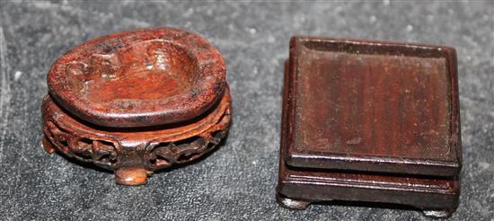 A collection of approximately thirty Chinese and Oriental hardwood stands, largest 18 x 10cm, smallest 3 x 2cm